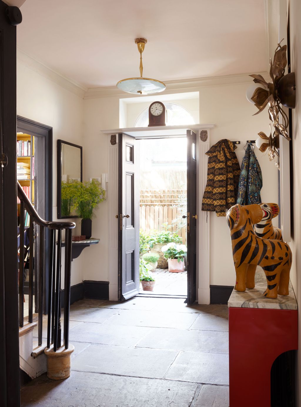 Image may contain Animal Wildlife Mammal Tiger Door Flooring and Floor