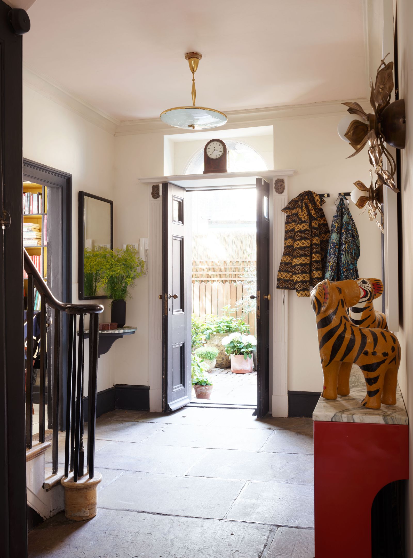 Image may contain Animal Wildlife Mammal Tiger Door Flooring and Floor