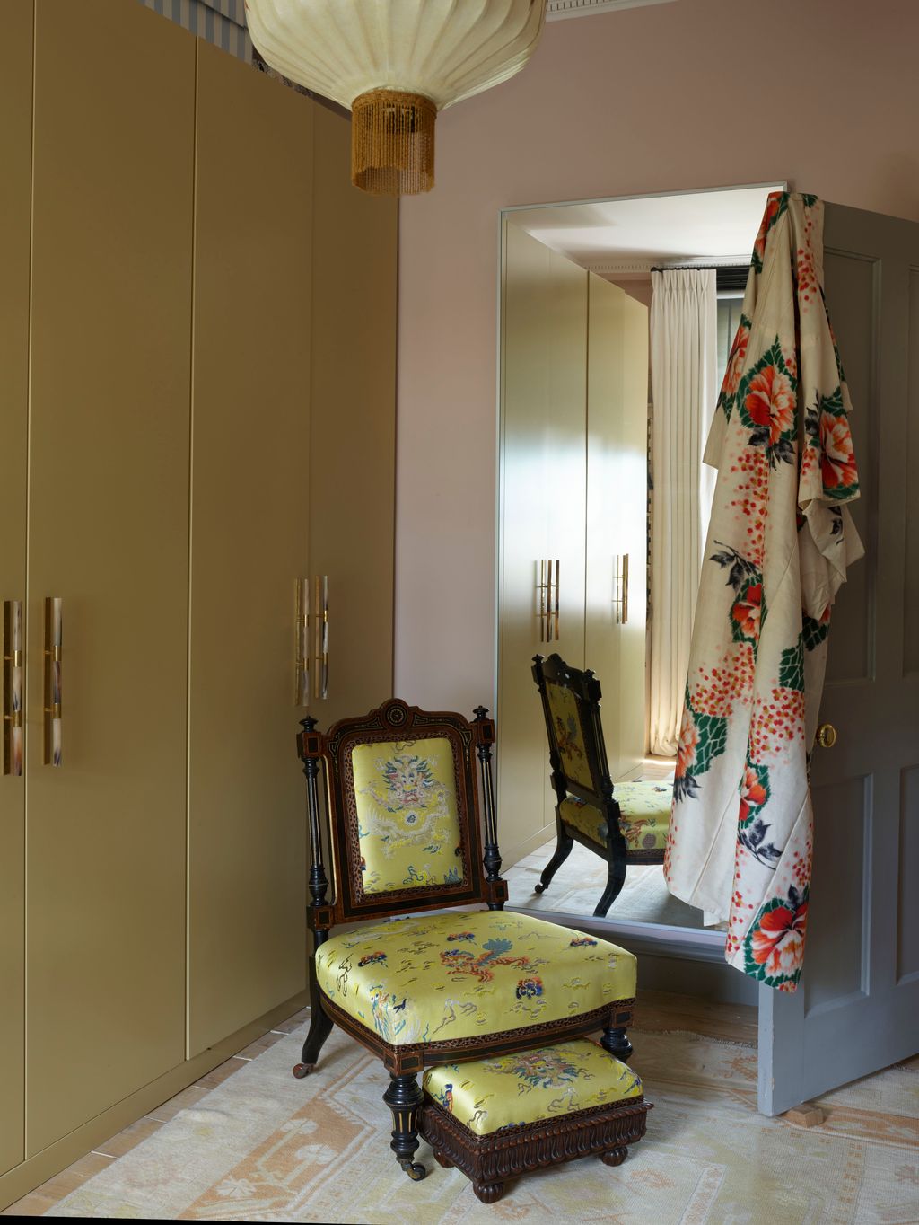 Image may contain Furniture Chair Home Decor Cupboard Closet Room Indoors Flooring Interior Design and Wood