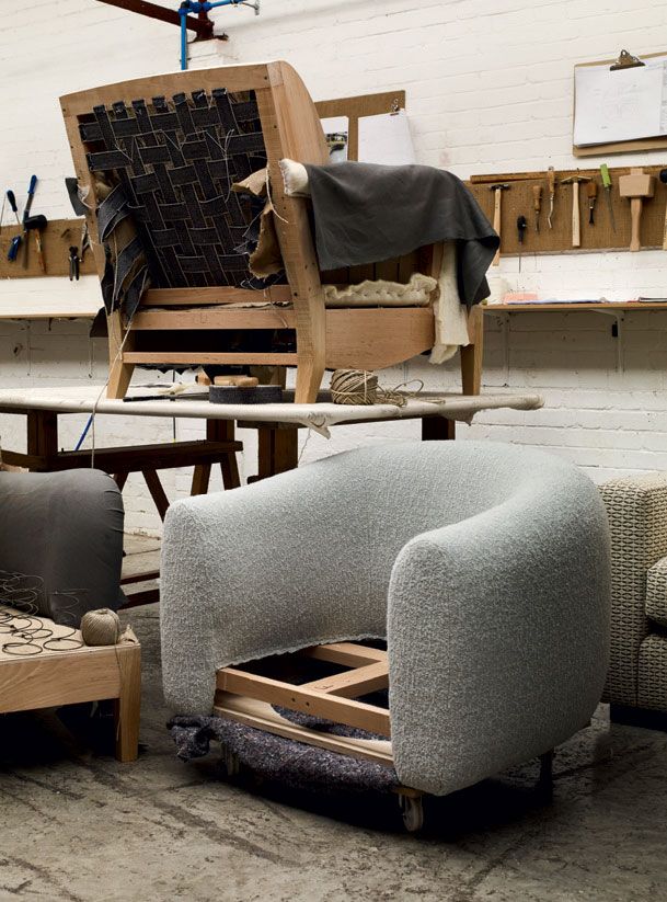 Image may contain Furniture Chair Wood Plywood Couch Interior Design Indoors Cushion Armchair Living Room and Room