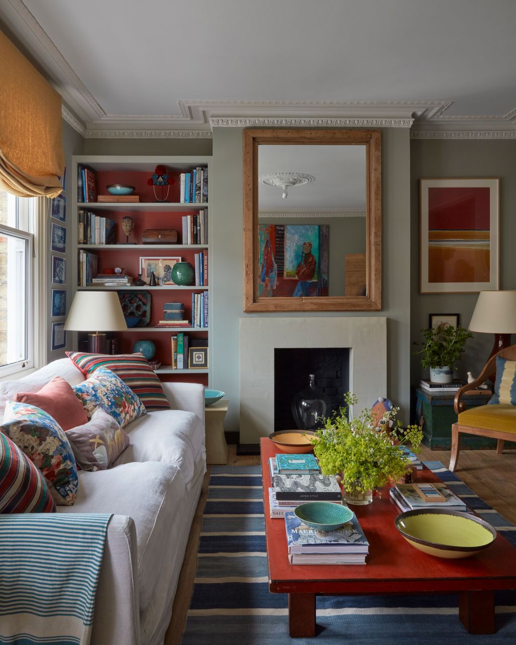 Image may contain Living Room Indoors Room Furniture Interior Design Cushion Couch and Home Decor