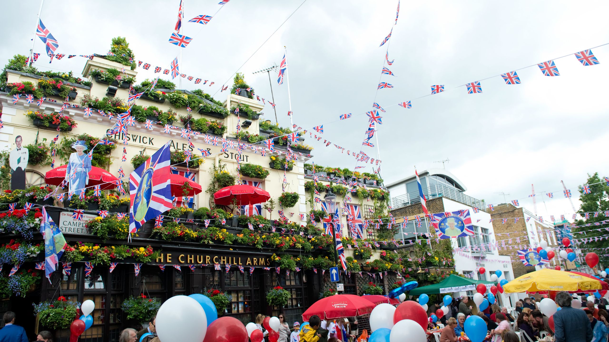 Image may contain Festival Crowd Human Person Balloon and Ball