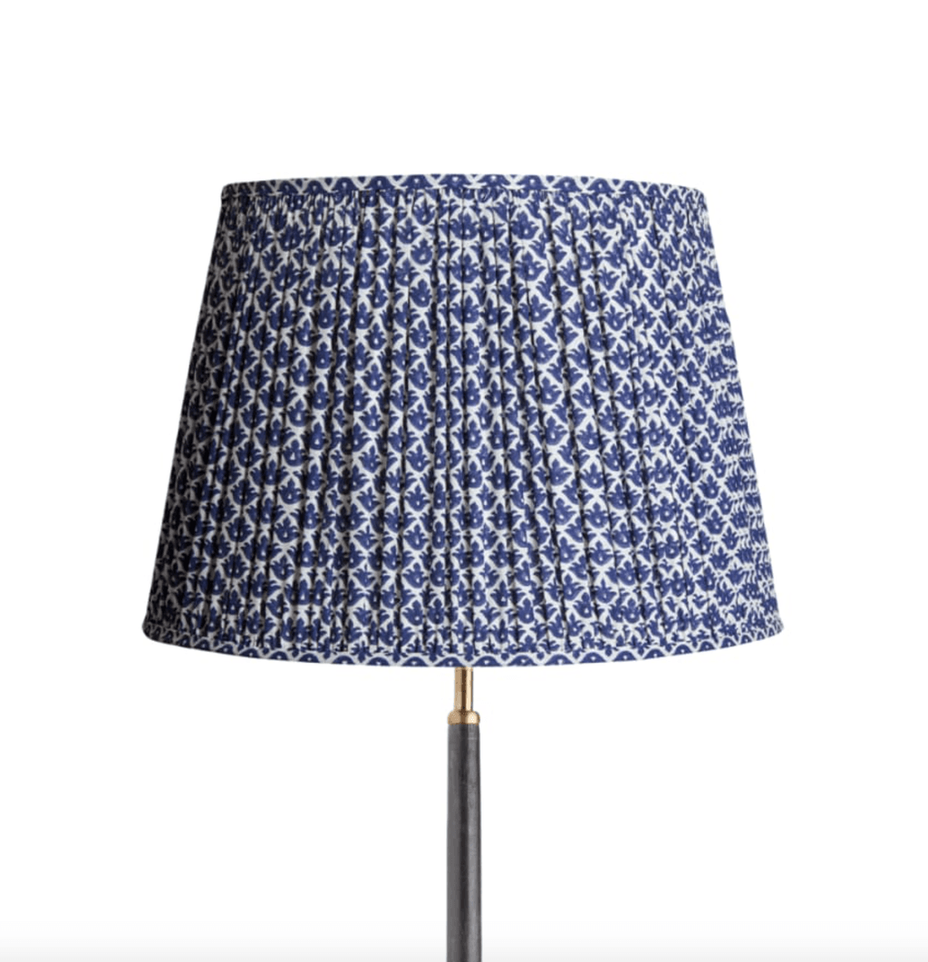 Image may contain Lamp and Lampshade