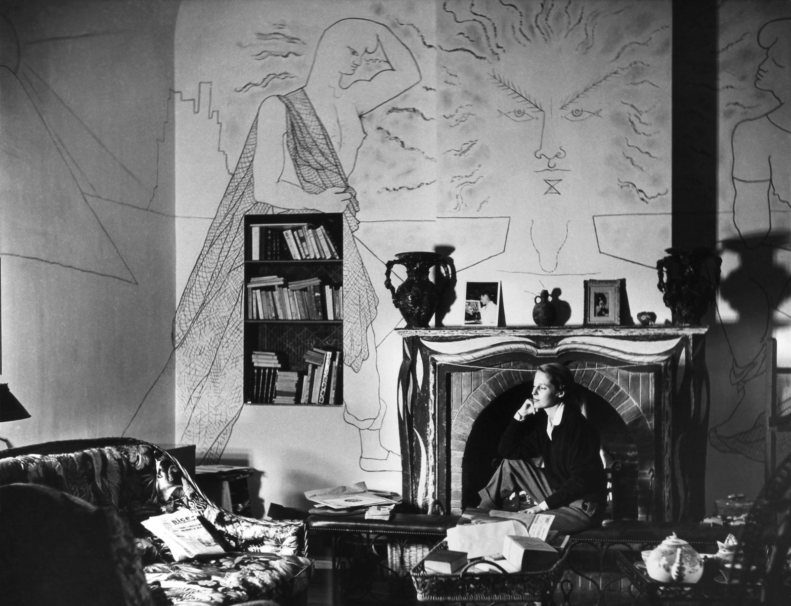 Image may contain Human Person Living Room Room Indoors Furniture Couch Fireplace Bedroom and Interior Design