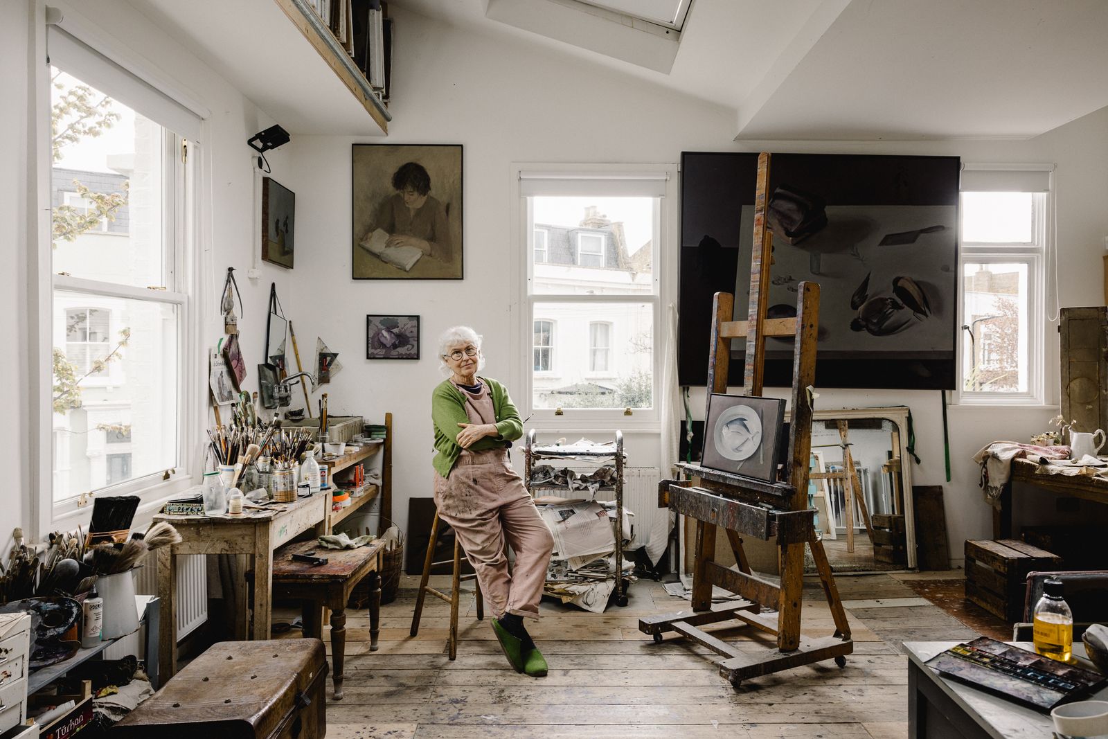 Image may contain Wood Plywood Workshop Flooring Human Person Furniture Hardwood Shelf Machine and Floor