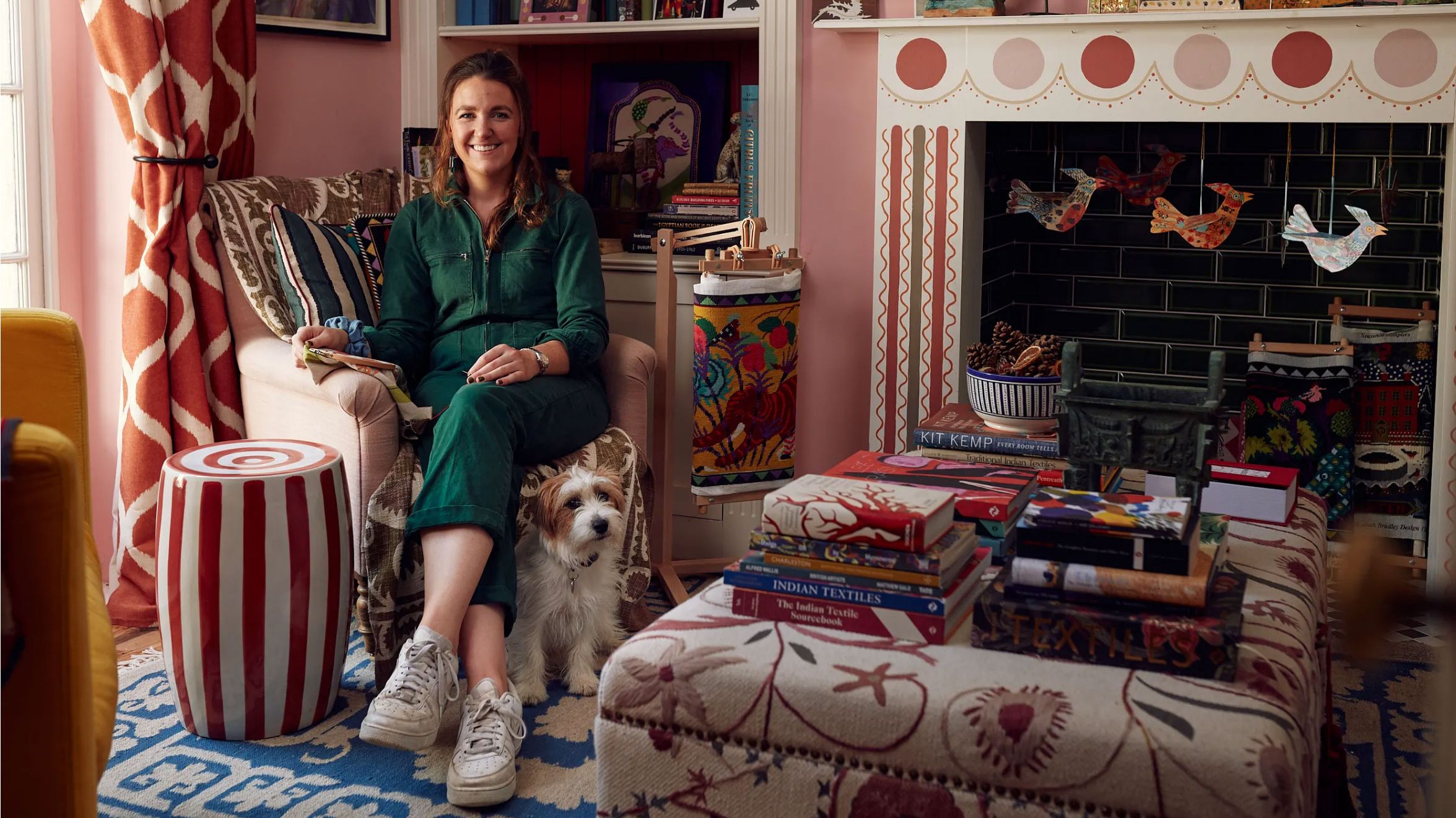 Image may contain Furniture Living Room Room Indoors Human Person Couch Home Decor Interior Design and Shelf