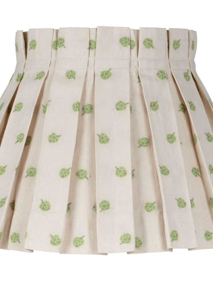 Image may contain: Clothing, Apparel, Skirt, Miniskirt, Furniture, and Crib