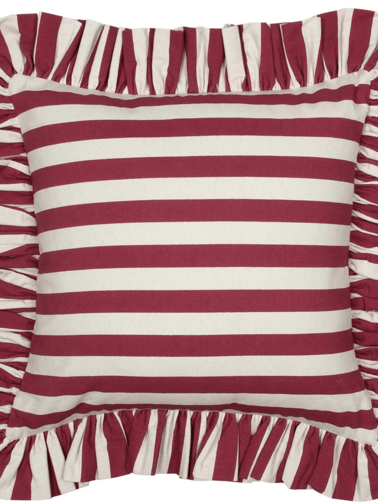 Image may contain: Cushion, Pillow, Symbol, and Flag