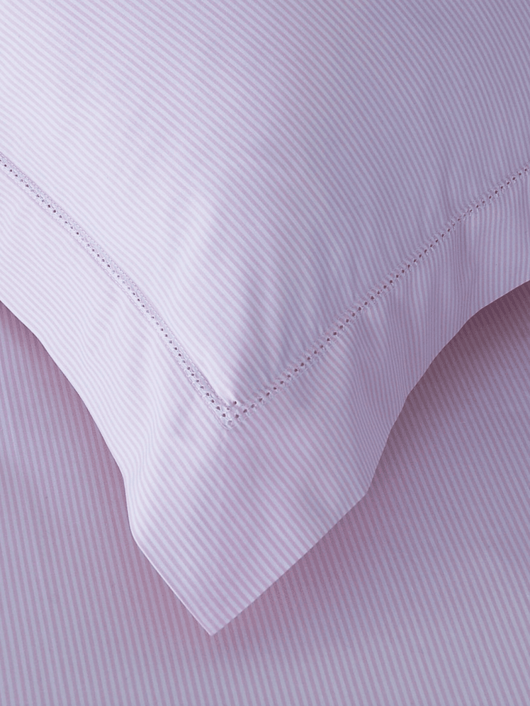 Image may contain: Home Decor, Cushion, Pillow, Linen, and Blanket