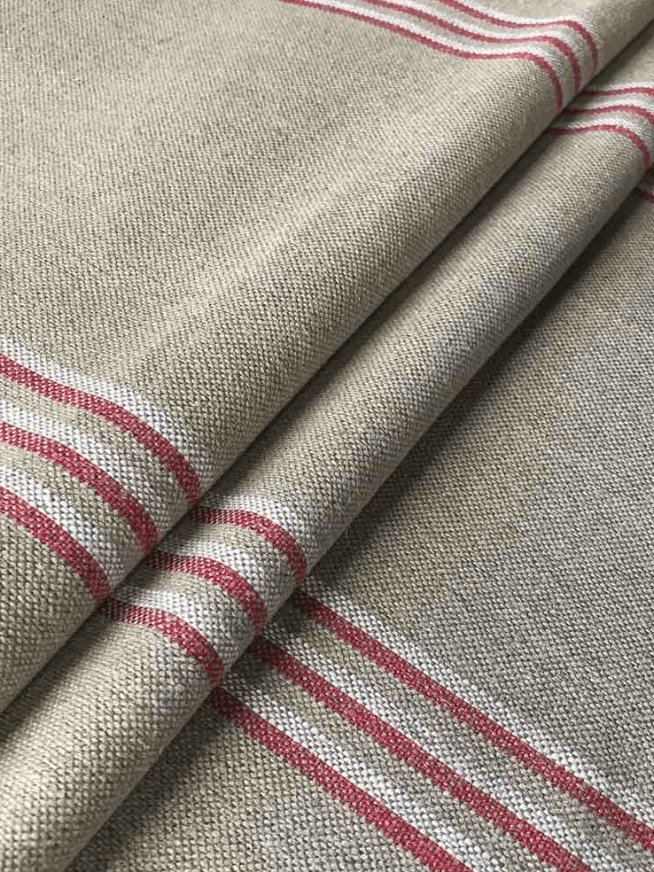 Image may contain: Home Decor, Linen, Clothing, Apparel, Pants, Rug, Denim, and Jeans