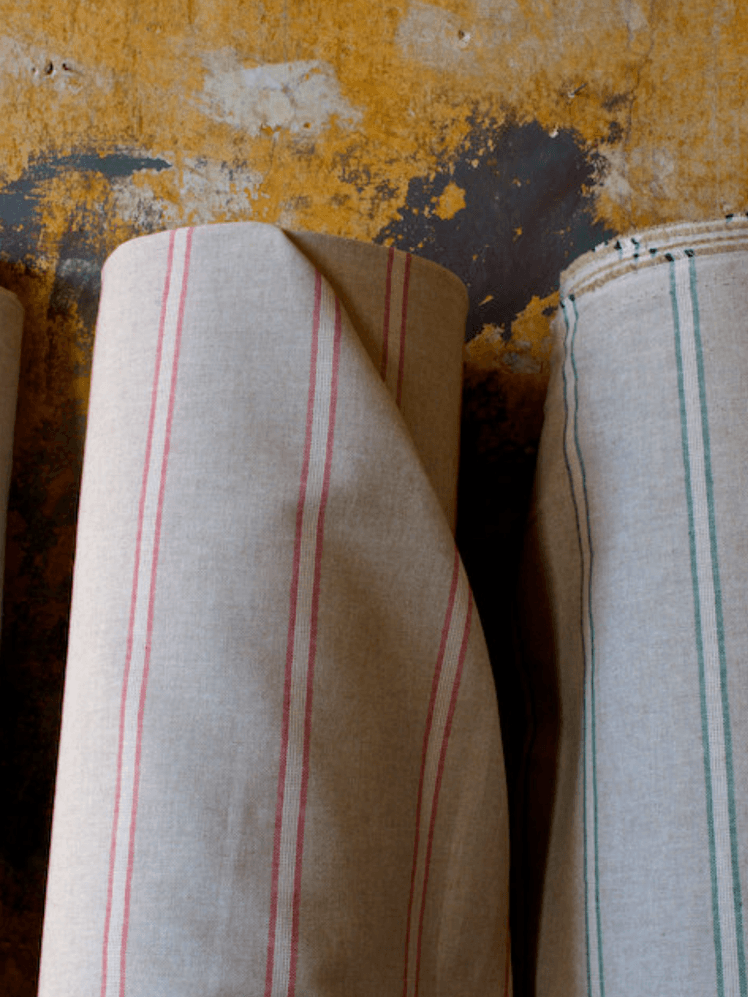 Image may contain: Home Decor, Cushion, Linen, Pillow, Couch, and Furniture