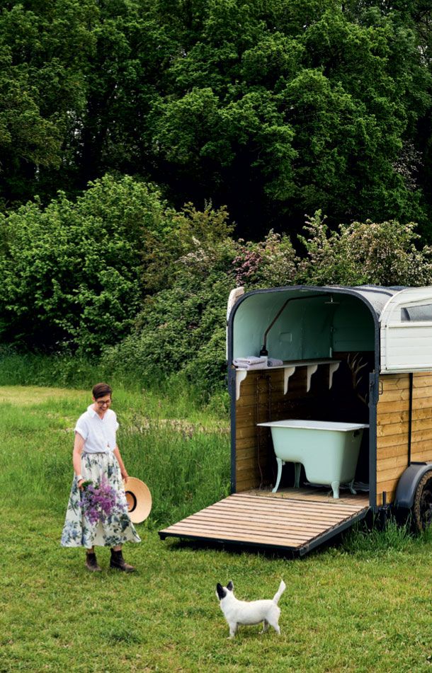 Image may contain Human Person Grass Plant Outdoors Transportation Vehicle Yard and Nature