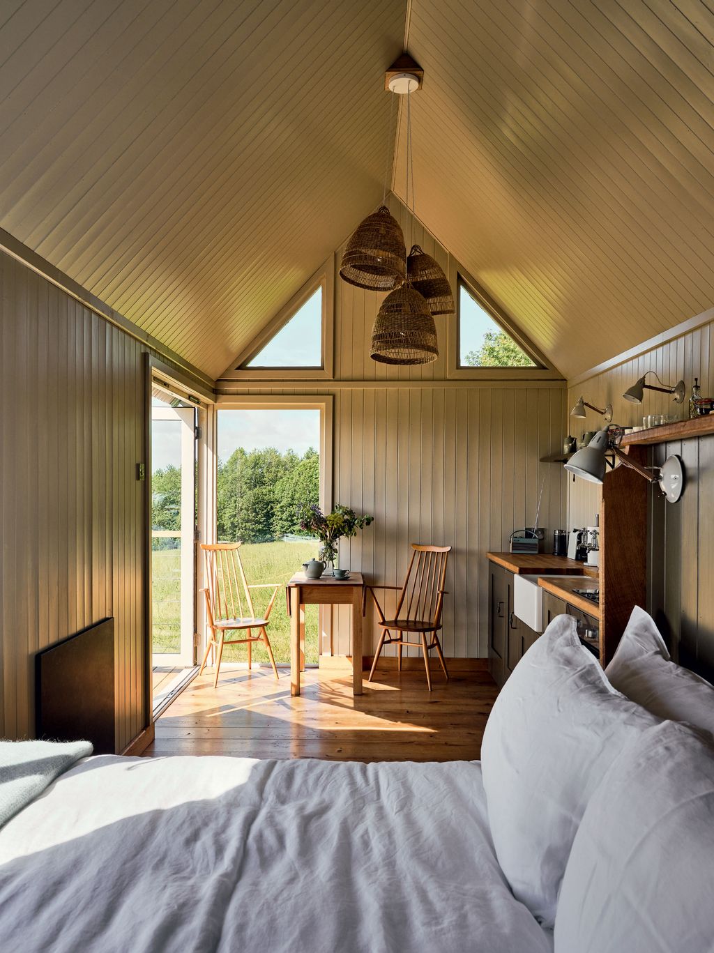 Image may contain Furniture Chair Building Housing Indoors Bed Wood Interior Design Room Bedroom and Architecture