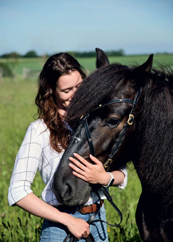 Image may contain Animal Mammal Horse Human Person Colt Horse and Stallion