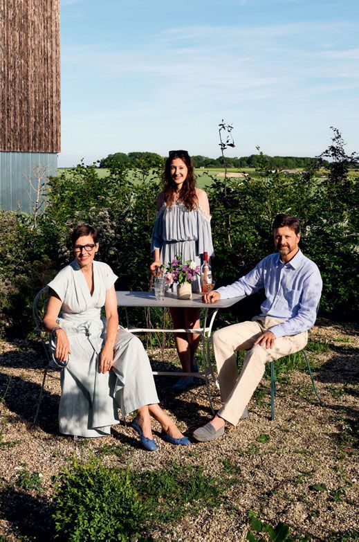 Ali Eden and Adam relaxing in their more informal gravel garden