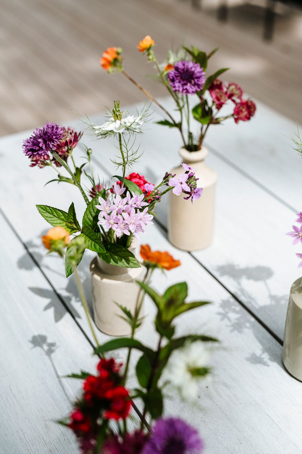 Using a mix of flower shapes will create dynamic arrangements with layers of texture and interest.