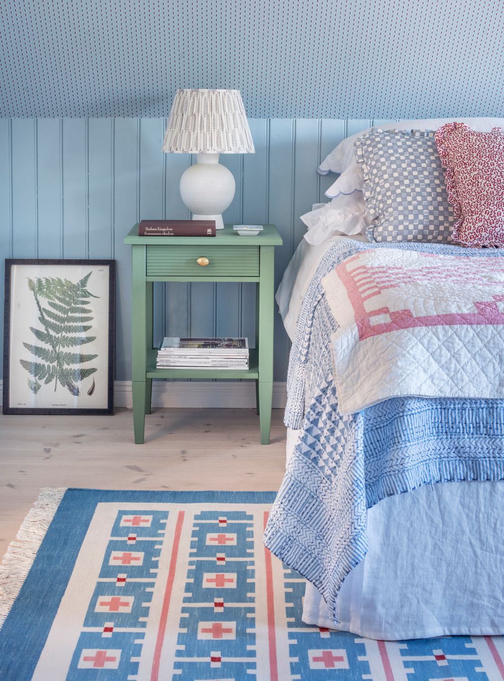 Image may contain Home Decor Lamp Table Lamp Furniture Bed Indoors Room Bedroom and Rug