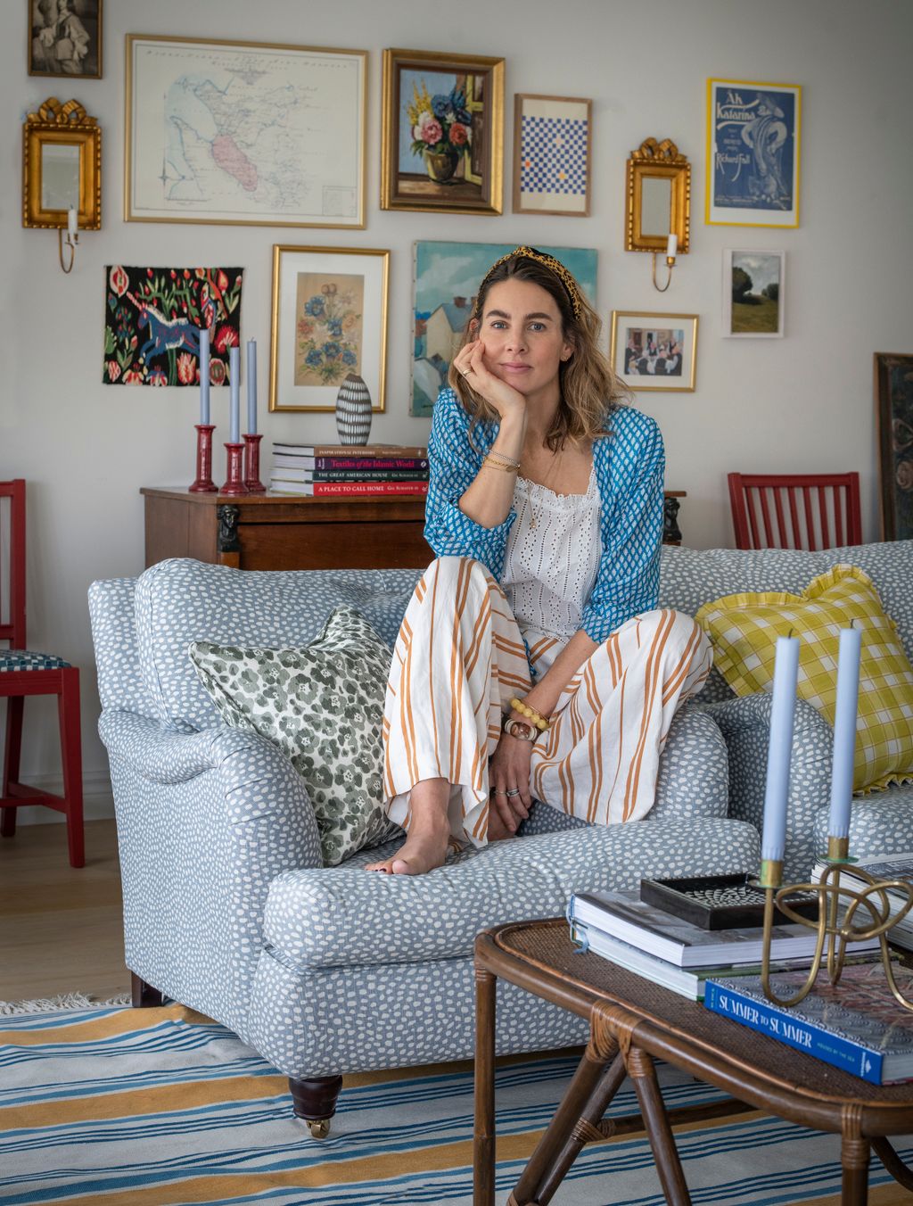 Image may contain Furniture Couch Living Room Room Indoors Human Person Chair and Bedroom