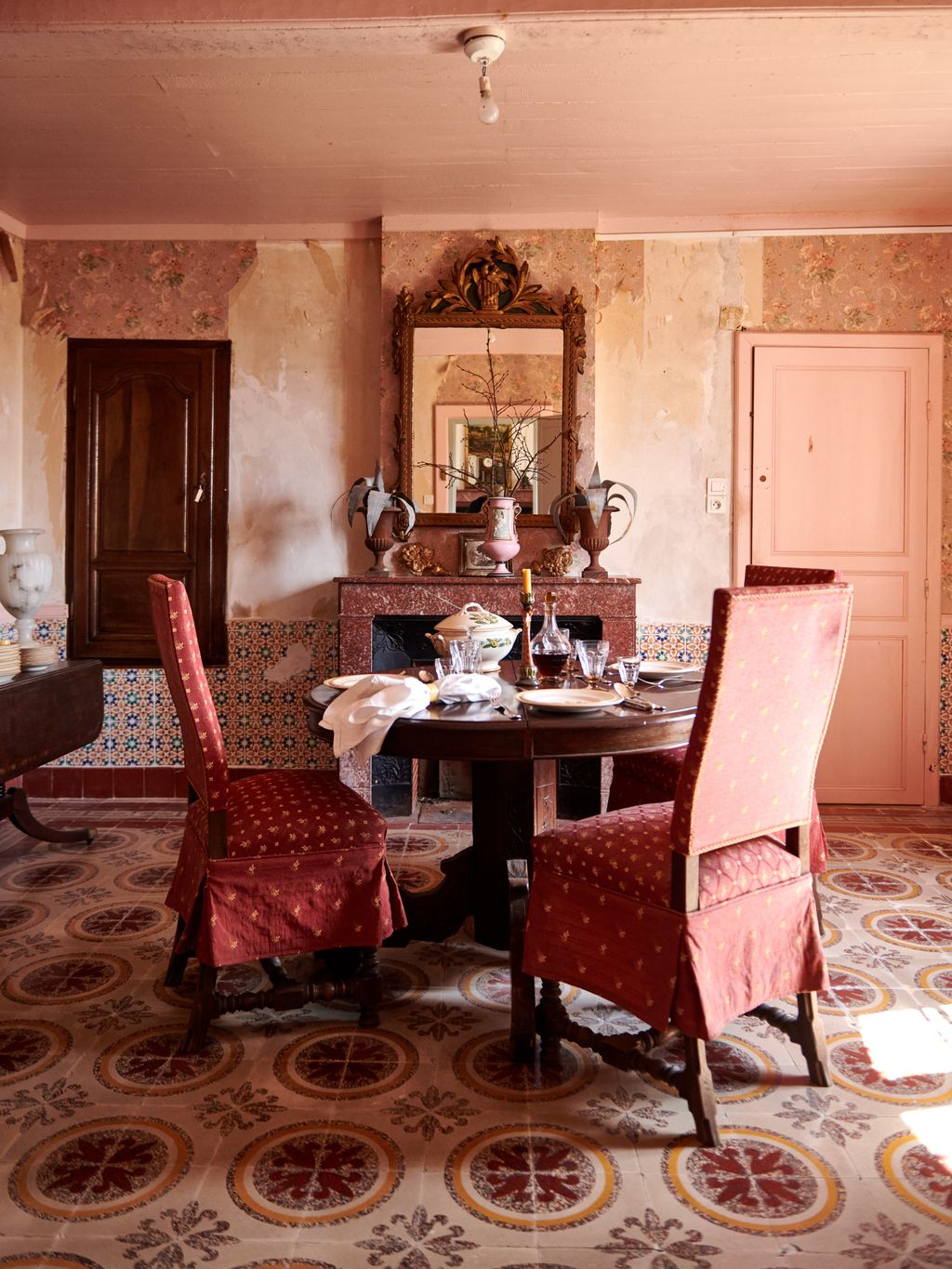 Image may contain Furniture Chair Room Indoors Dining Room Home Decor Living Room Dining Table and Table