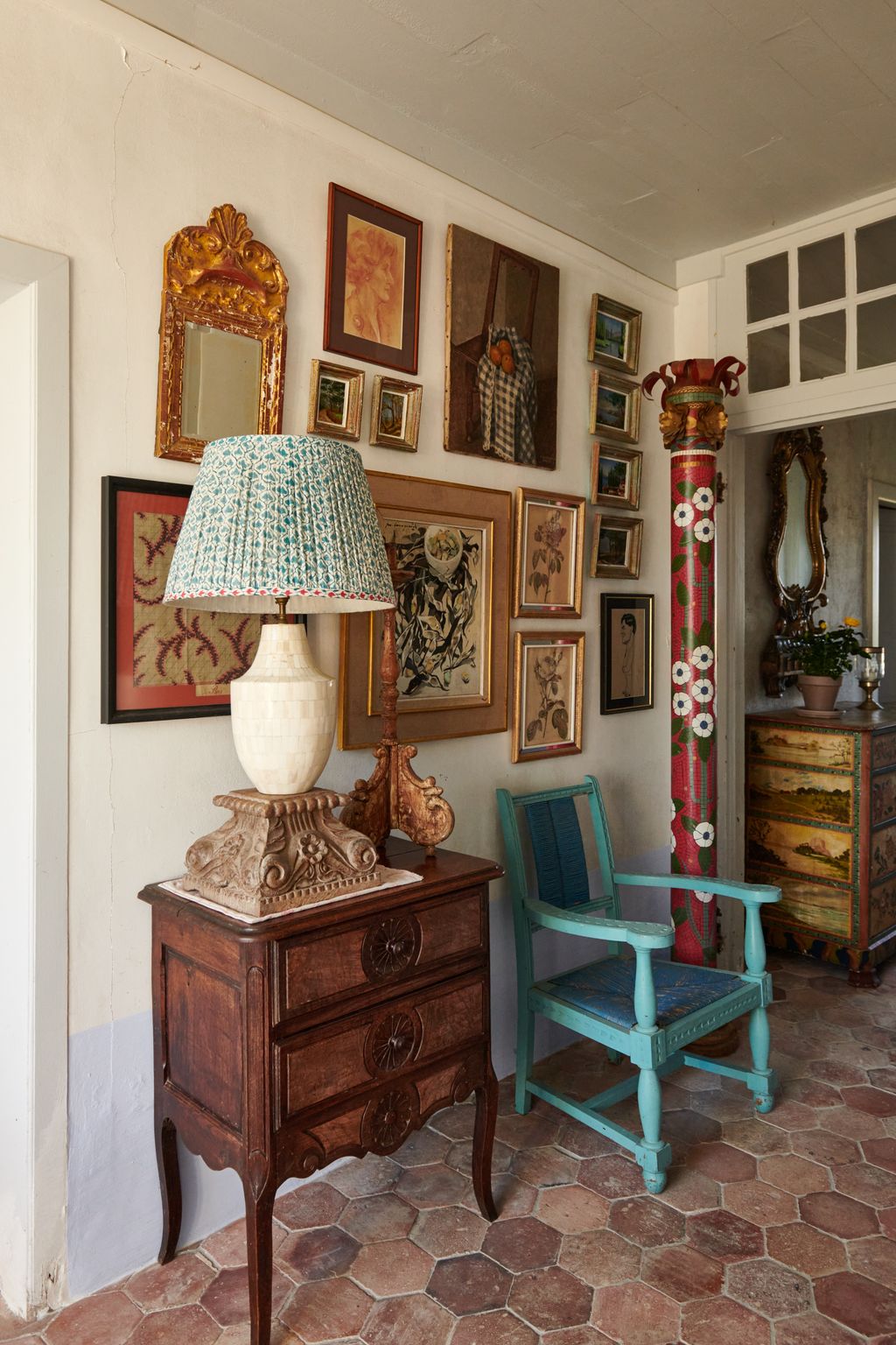 Image may contain Furniture Chair Interior Design Indoors Lamp Table Lamp Corner Wood Cabinet and Hardwood