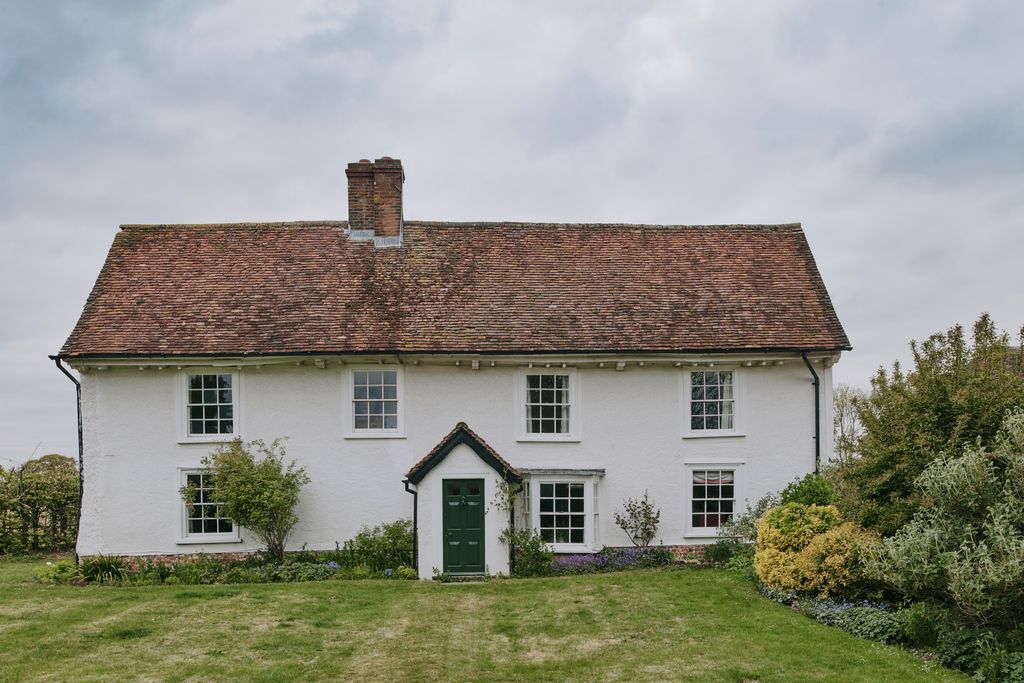 Image may contain Cottage Housing House Building Grass Plant Roof Outdoors Nature Shelter Countryside and Rural