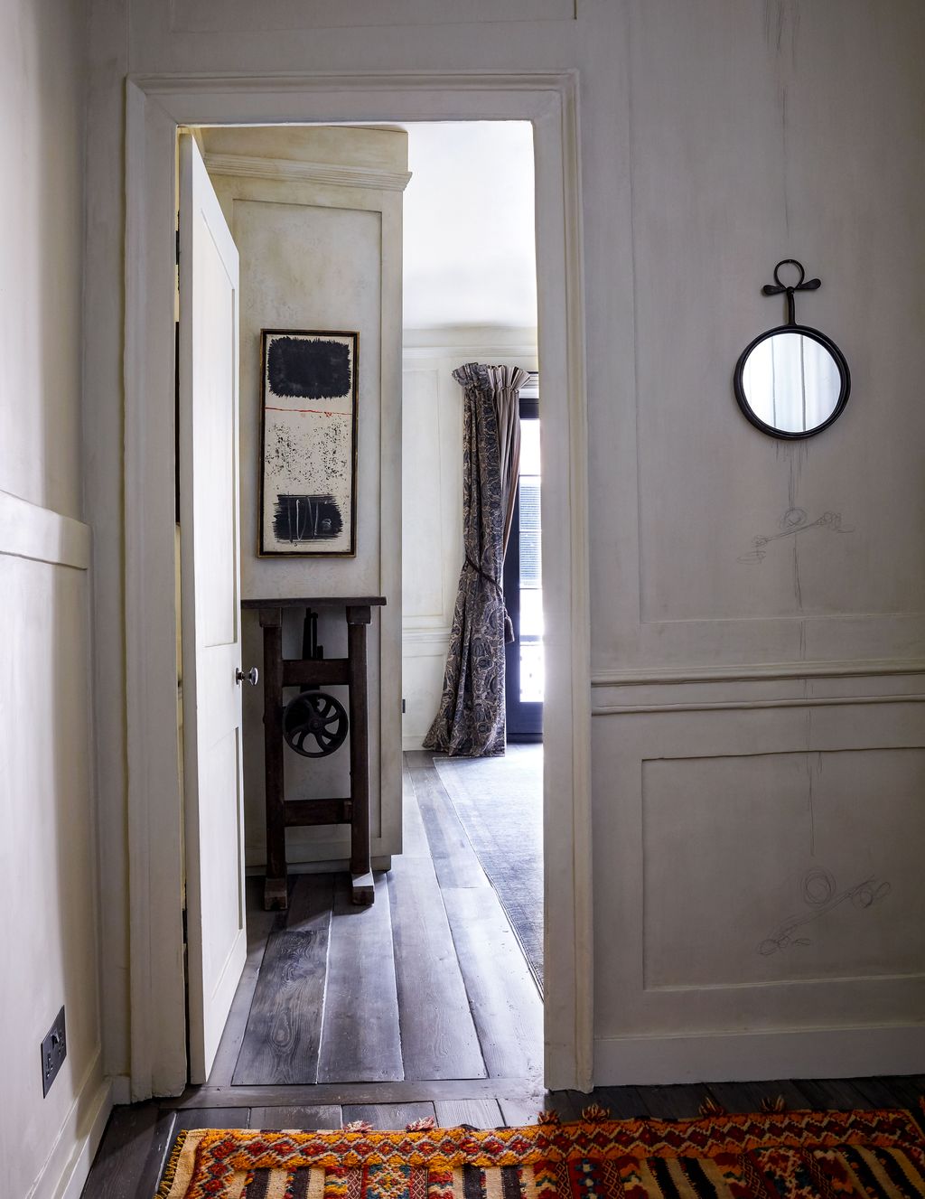 Image may contain Flooring Floor Wood Interior Design Indoors Hardwood Corridor Furniture and Door