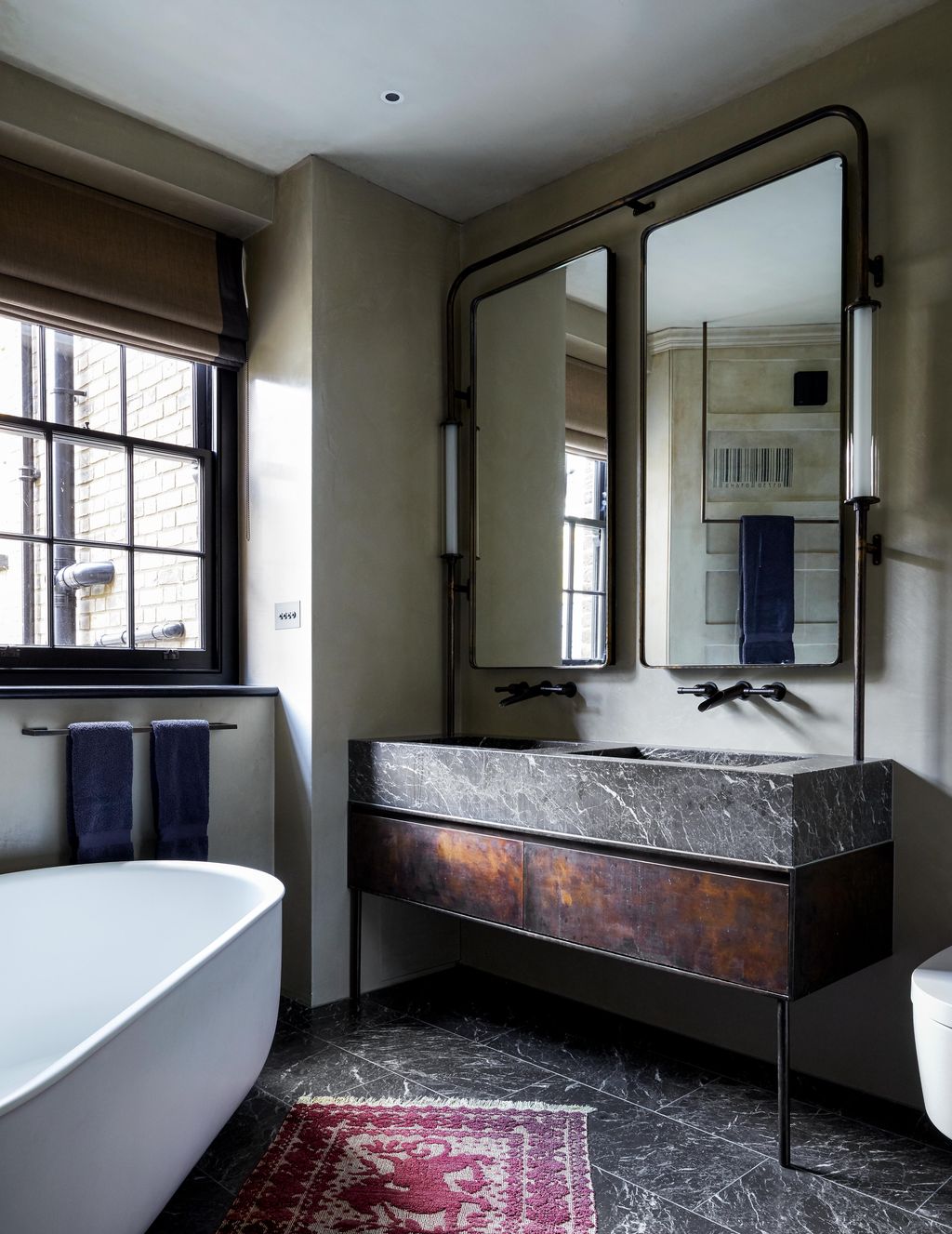 Image may contain Indoors Room Tub Bathtub and Interior Design