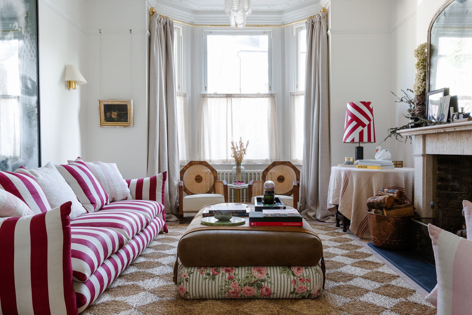 Image may contain Living Room Indoors Room Furniture Couch Interior Design Rug and Cushion