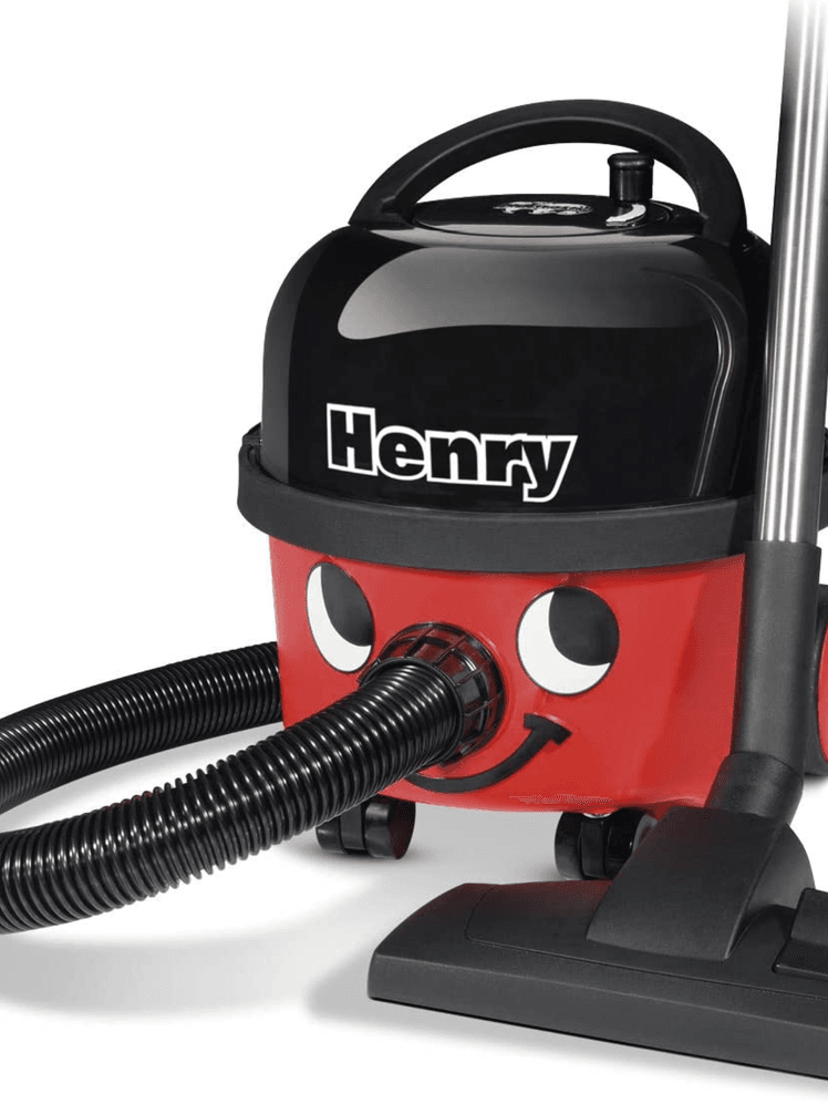 Image may contain: Appliance, Vacuum Cleaner, Tool, and Lawn Mower