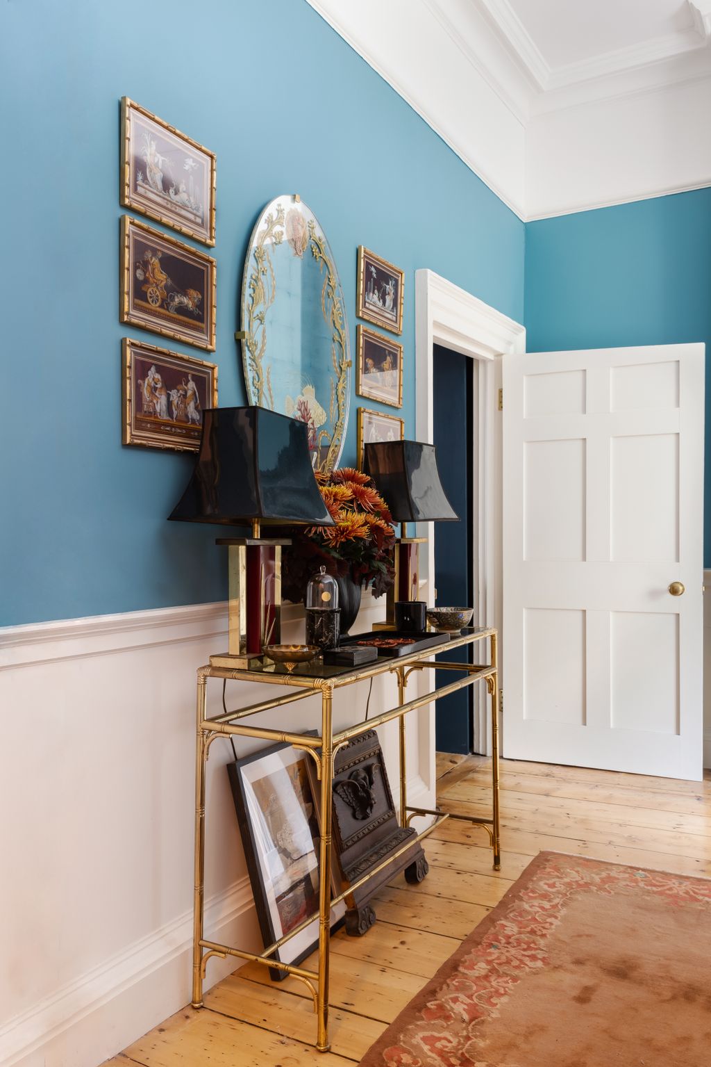 Image may contain Corner Wood Furniture Hardwood Sideboard Interior Design Indoors Flooring Living Room and Room