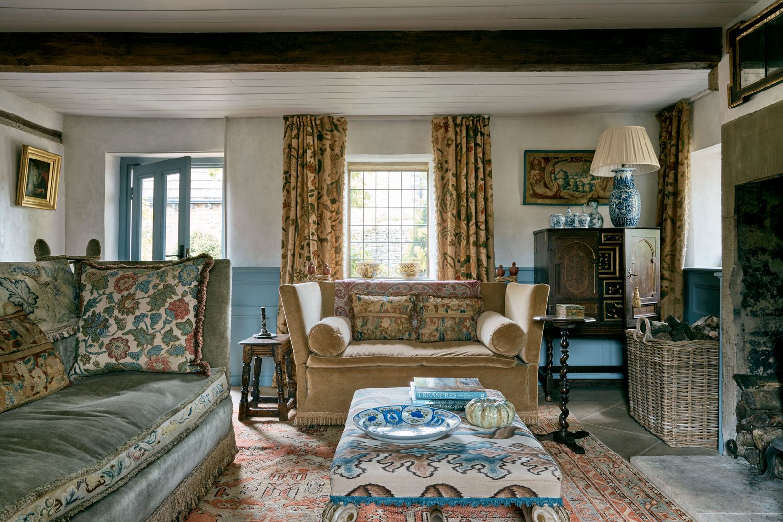 Image may contain Living Room Indoors Room Couch Furniture and Rug