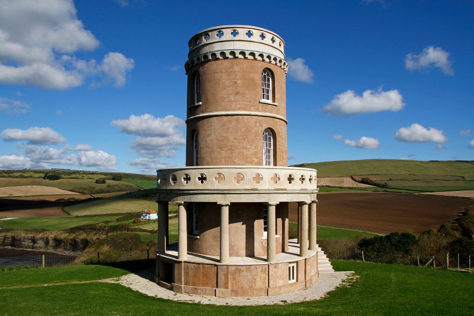 Image may contain Lighthouse Architecture Tower Building Beacon Grass and Plant