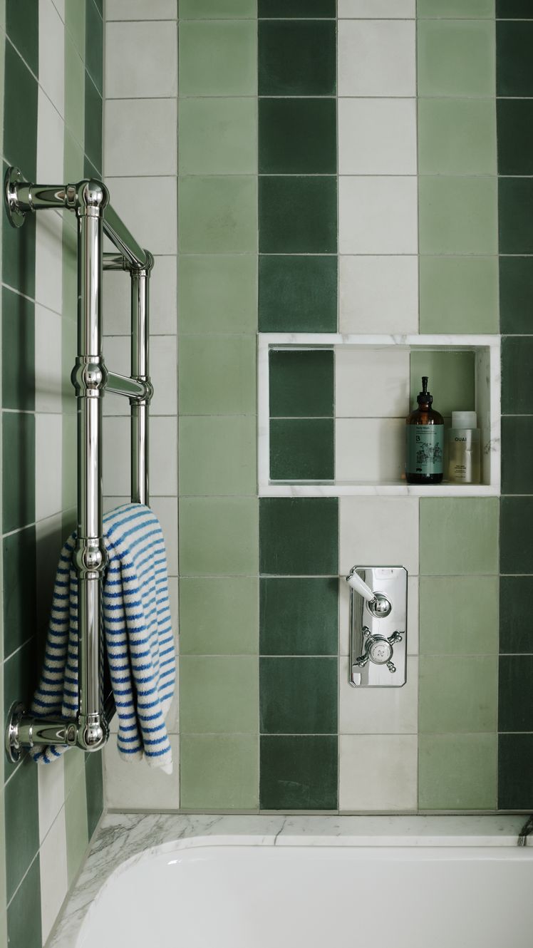 Image may contain Indoors Room Bathroom Shower Faucet and Shower