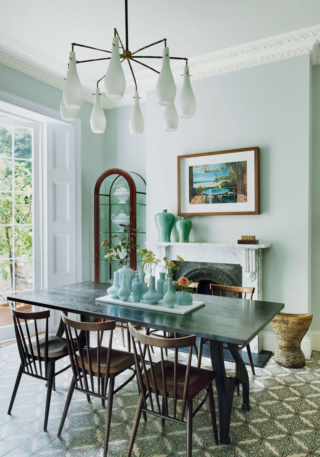 Image may contain Furniture Chair Room Indoors Dining Room Dining Table Table Interior Design and Tabletop