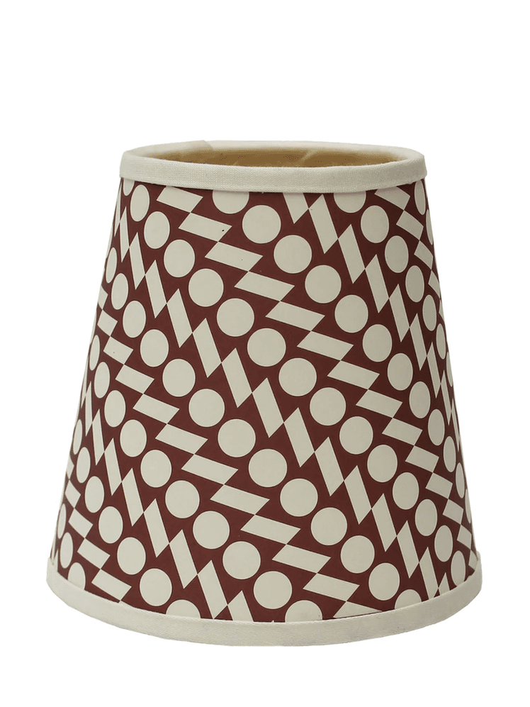 Image may contain: Lamp, Lampshade, and Rug