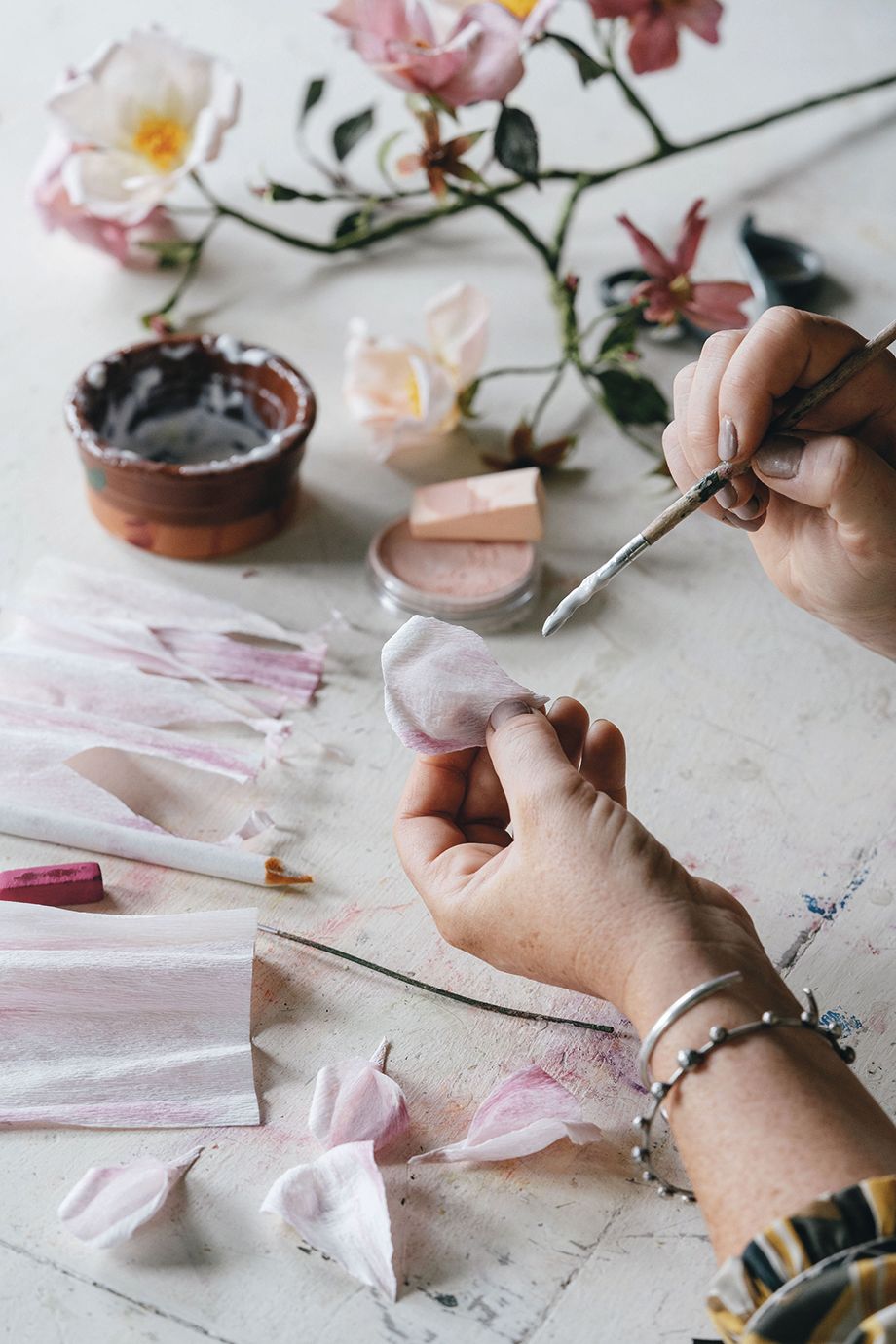 Image may contain Human Person Finger Cutlery and Spoon