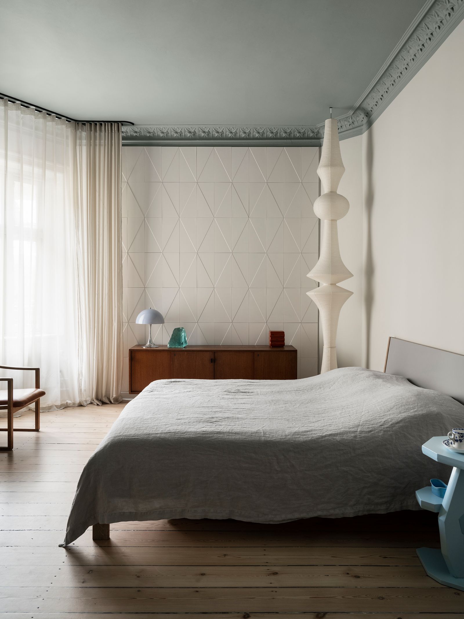 Image may contain Indoors Room Bedroom Furniture Bed Interior Design Wood and Flooring