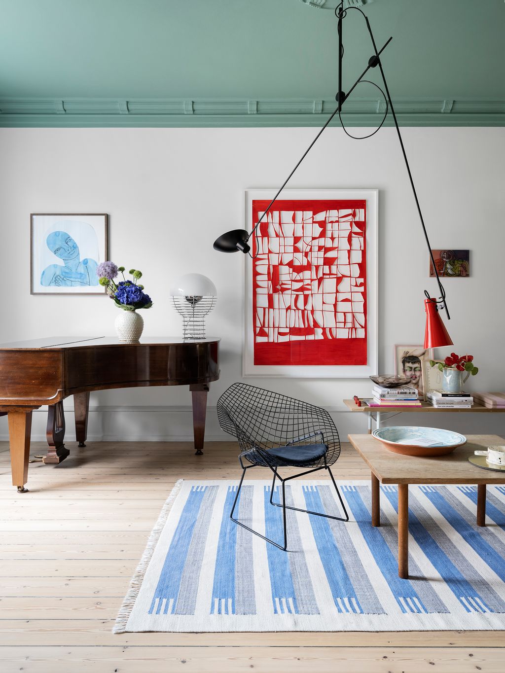 Image may contain Furniture Table Coffee Table Tabletop Rug Wood Interior Design and Indoors