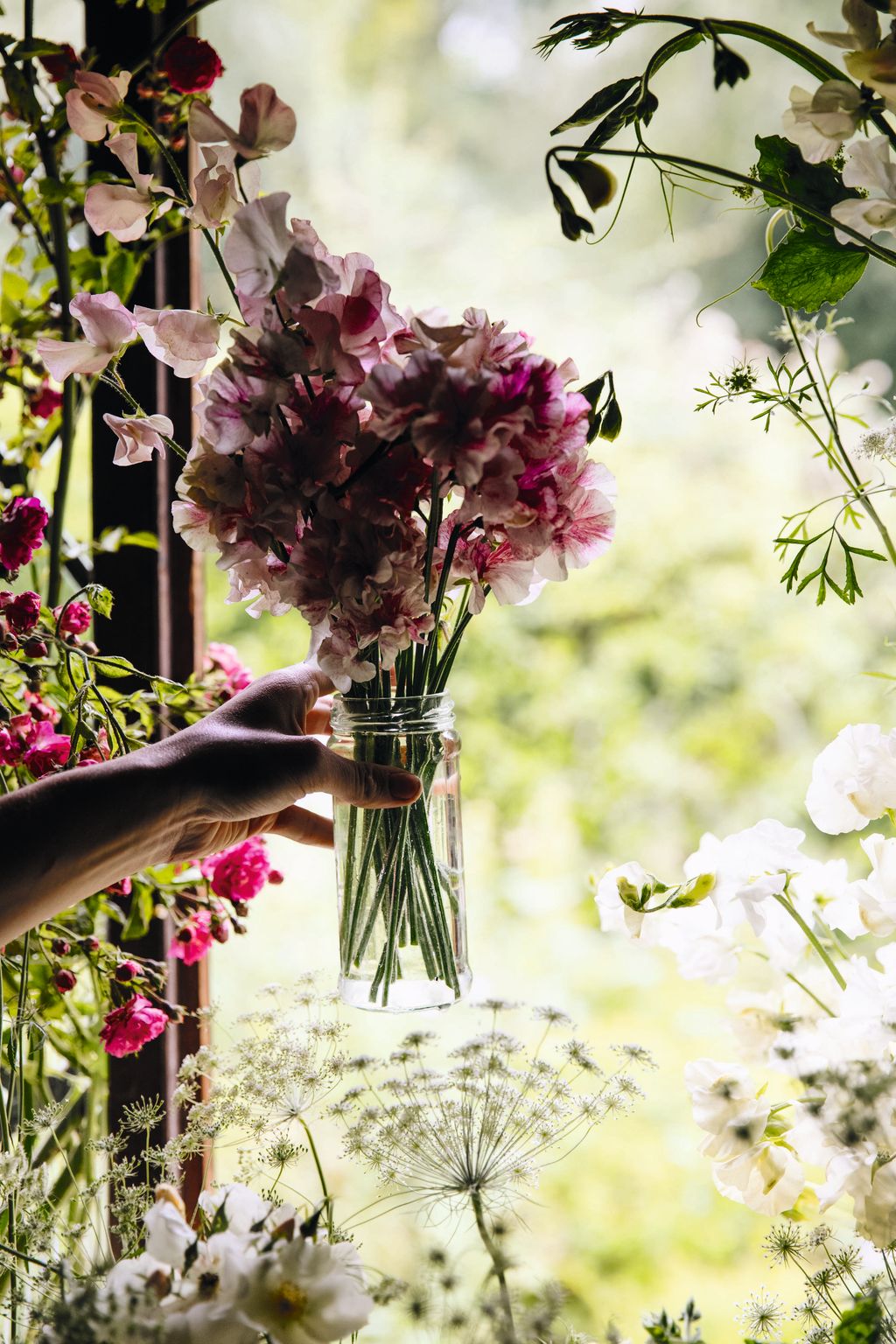 Image may contain Plant Human Person Flower Blossom Flower Arrangement Flower Bouquet Animal and Bird