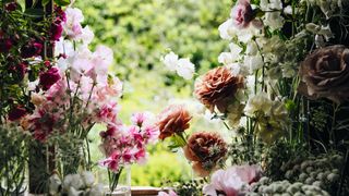 Image may contain Plant Flower Blossom Rose Flower Arrangement and Flower Bouquet
