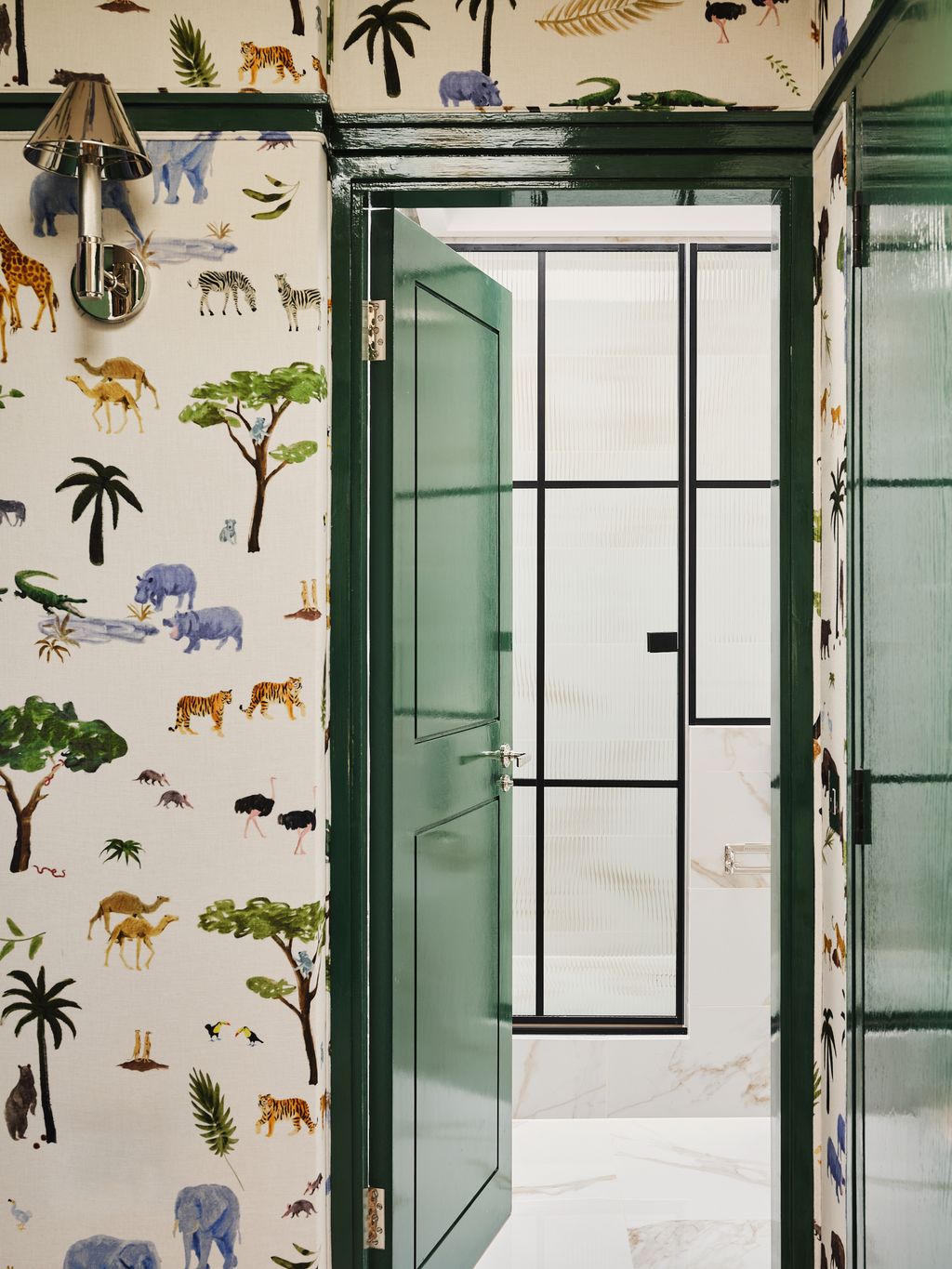 At the end of the corridor is the main bathroom.