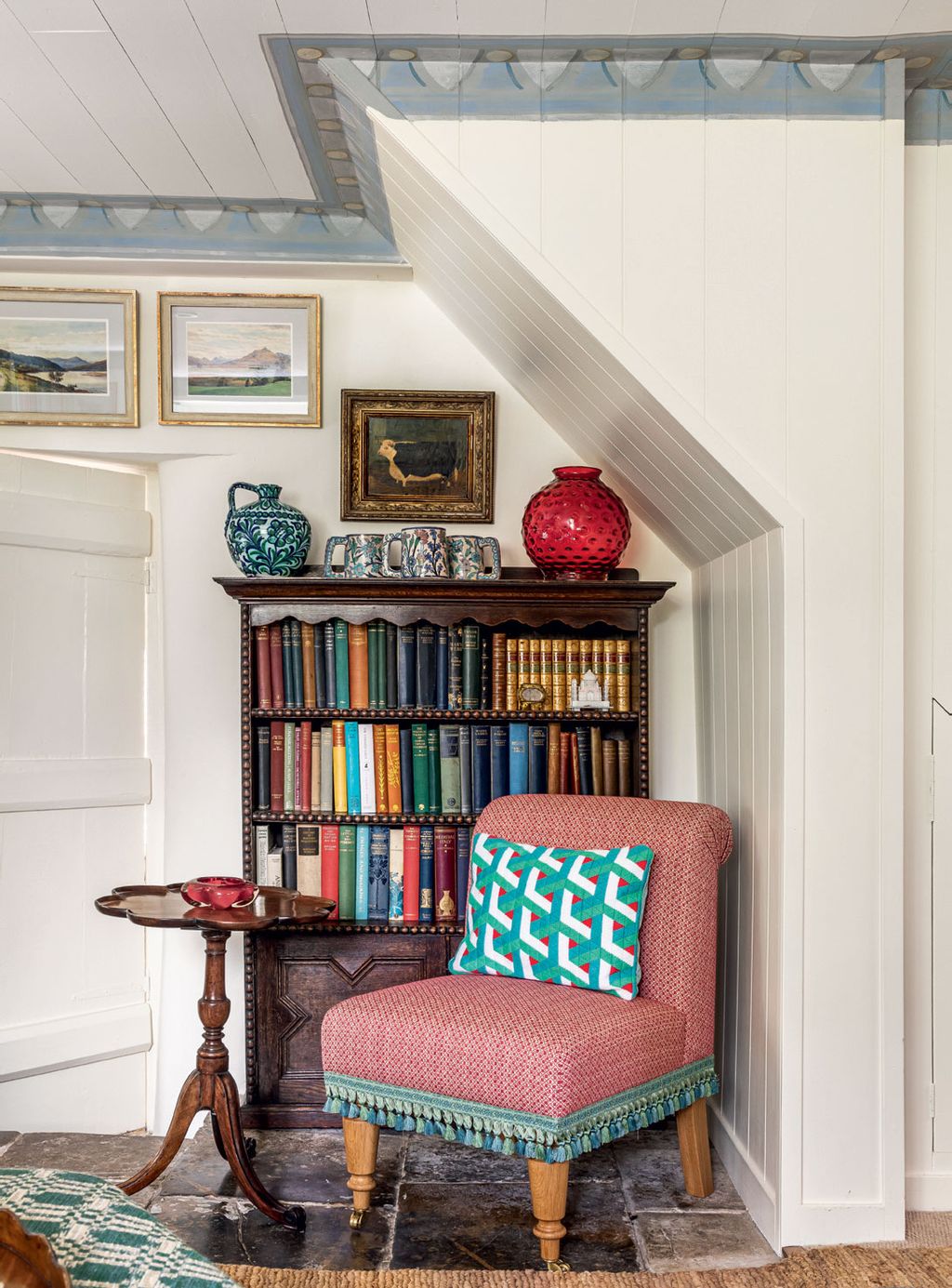 Image may contain Furniture Chair Shelf Bookcase Living Room Indoors Room and Interior Design