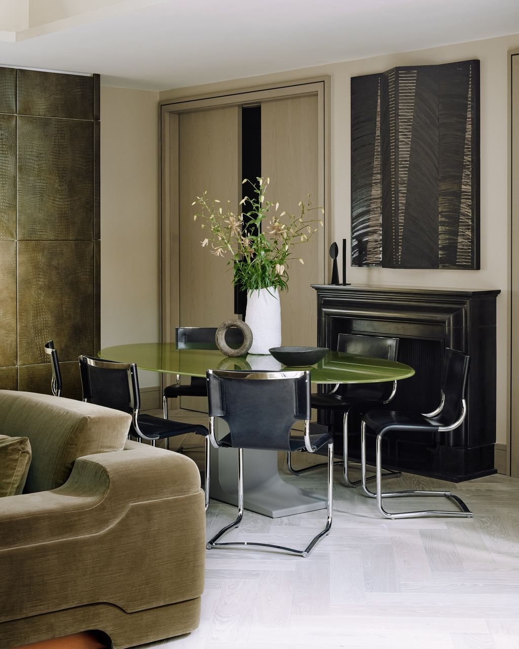 Image may contain Furniture Chair Home Decor Interior Design Indoors Room Flower Ikebana Ornament and Vase