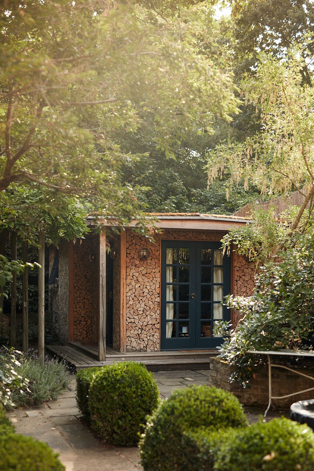 The hut built by Shackadelic. The wood of it smells so lovely and the foxes from the park like to sunbathe on the roof.