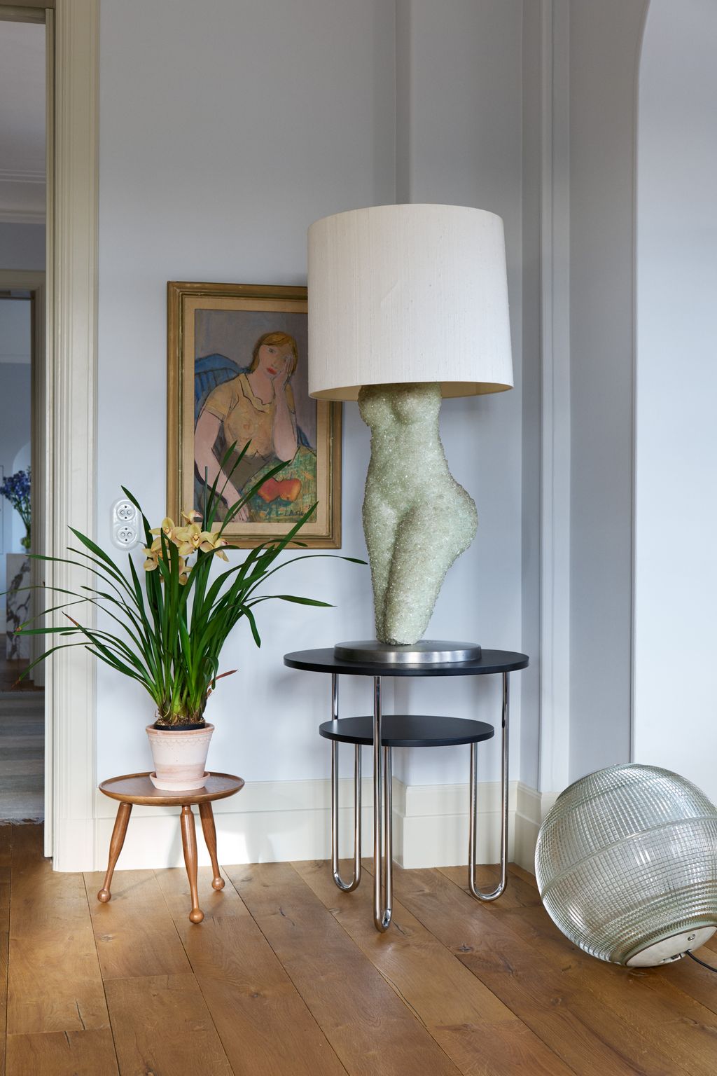 Image may contain Lamp Marie Laurencin Furniture Human Person Living Room Room Indoors Table Lamp and Table