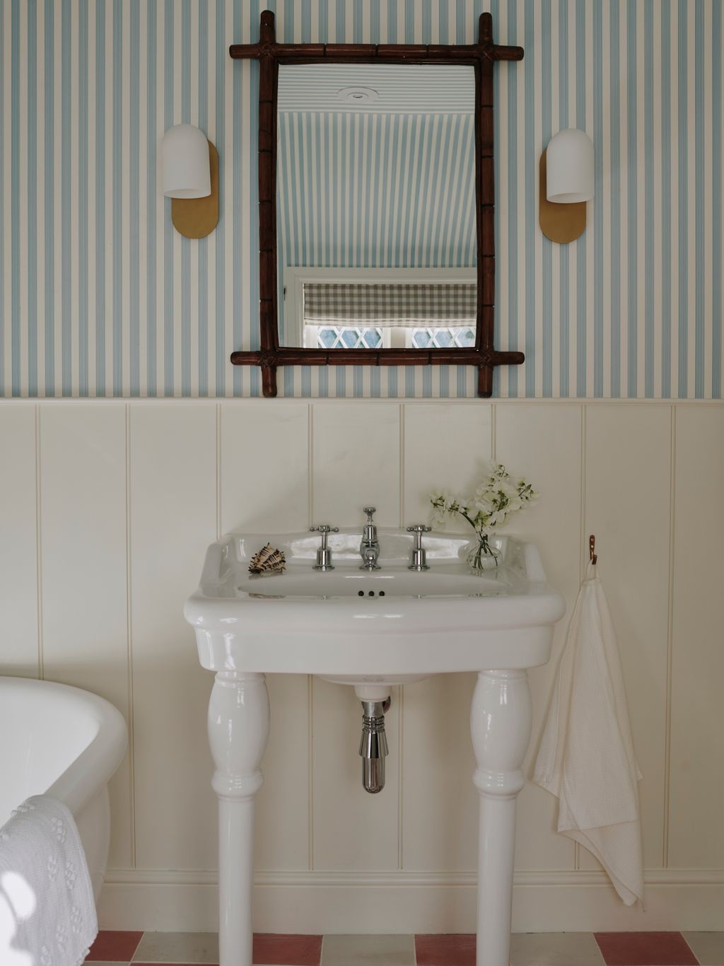 Tongue and groove panelling gives the main bathroom a comfortable feel painted in Farrow  Ball's ‘Pointing with the...