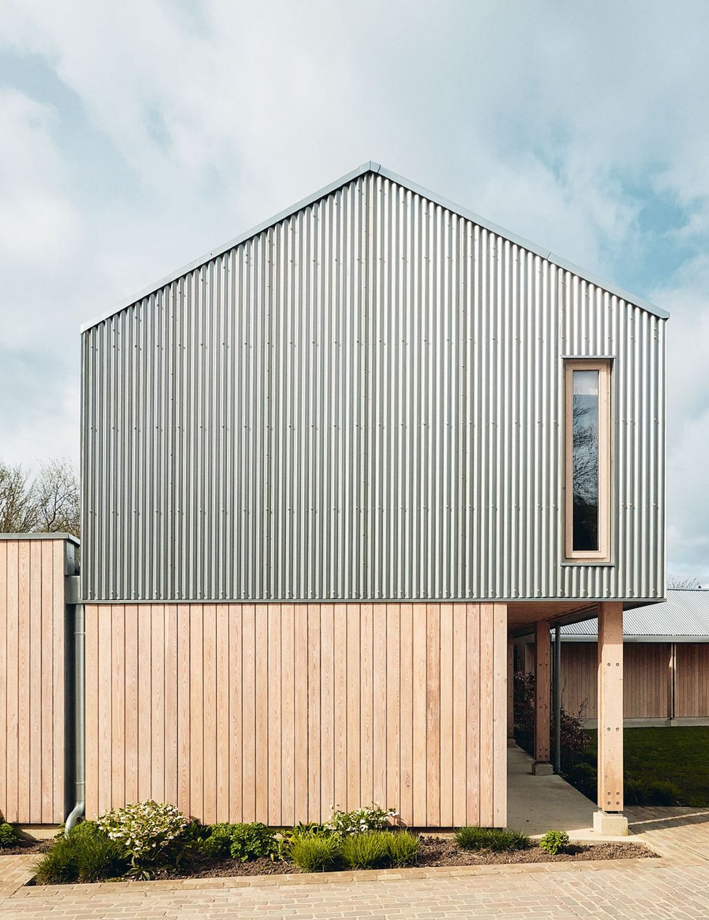 Materials with agricultural associations such as galvanised steel and larch were used to give an authentic feel to the...