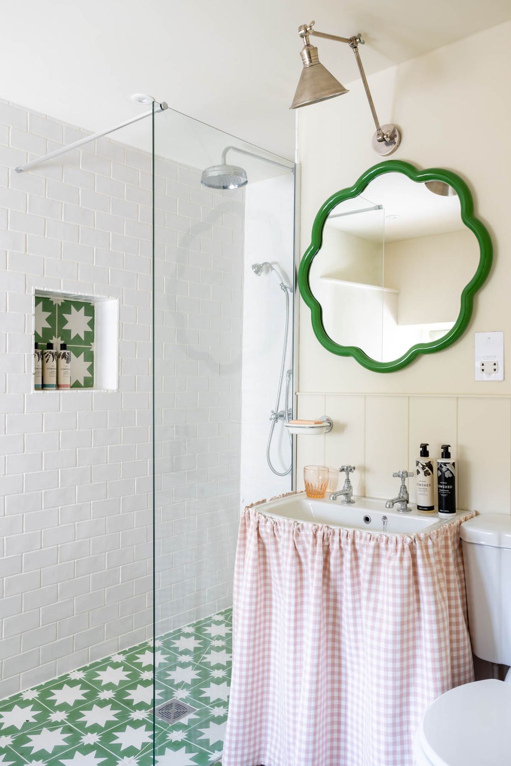 The upstairs bathroom has the same colour scheme as the one on the ground floor but in a more paredback way with Bert ...