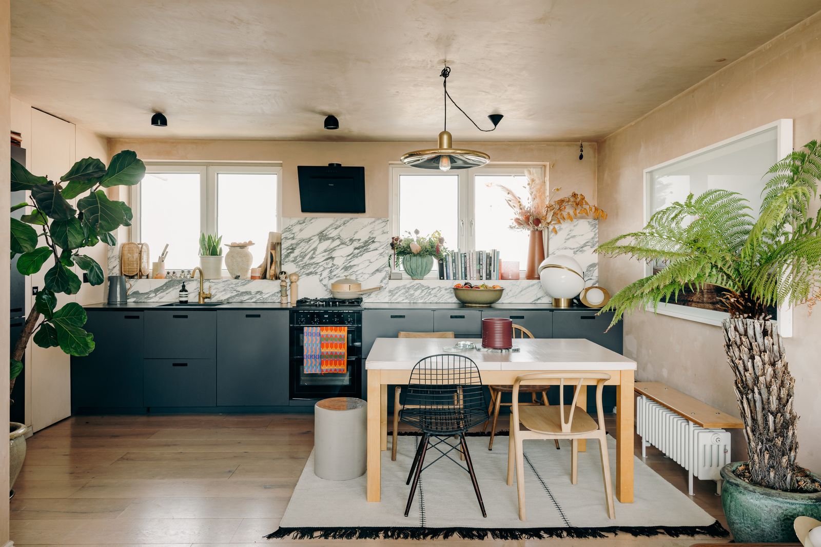 Image may contain Room Indoors Interior Design Kitchen Living Room Furniture and Chair