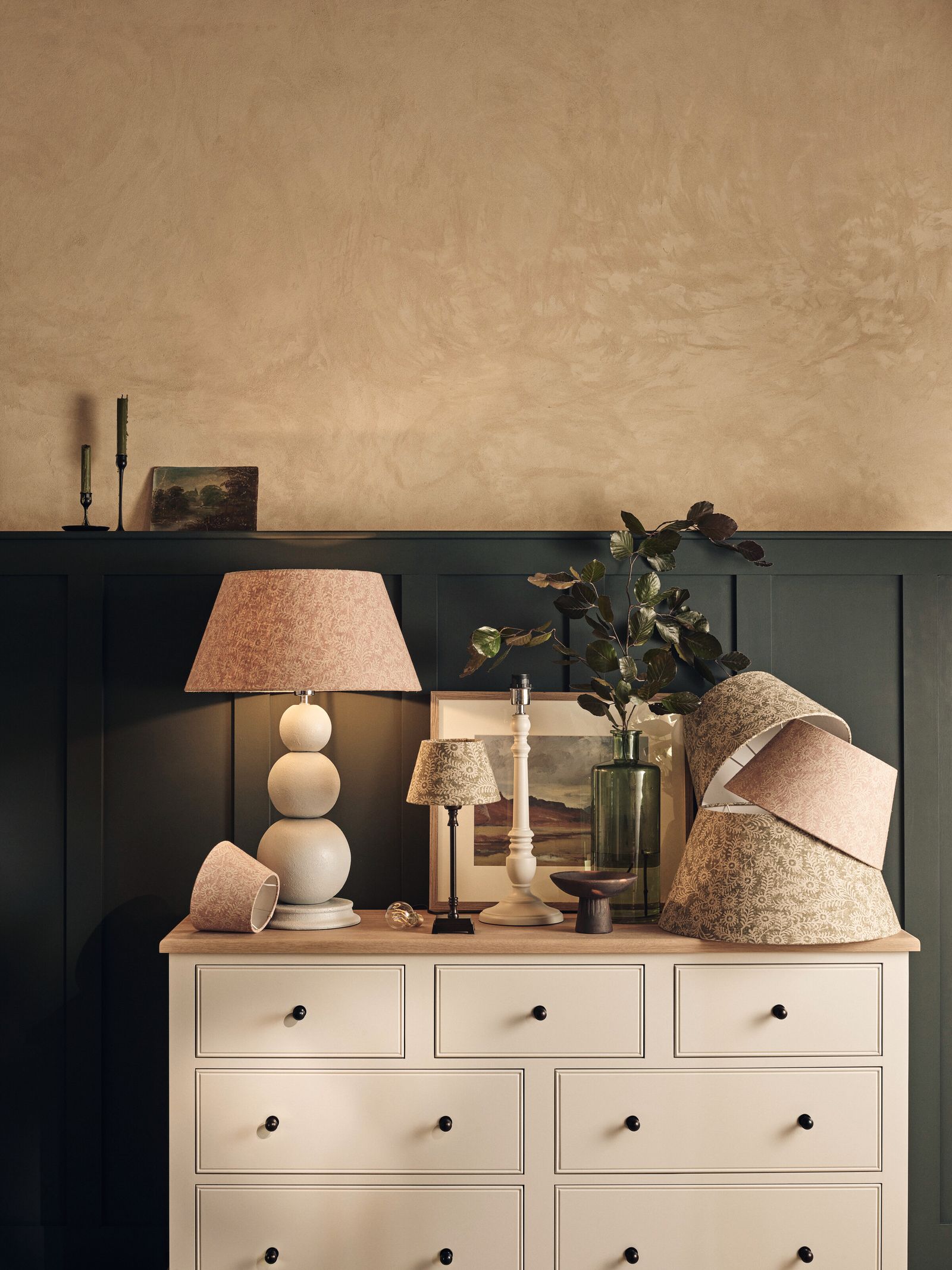 Image may contain Furniture Cabinet Lamp Table Lamp and Dresser